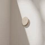 Orville LED Round Travertine Backlit Stone Wall Light Natural